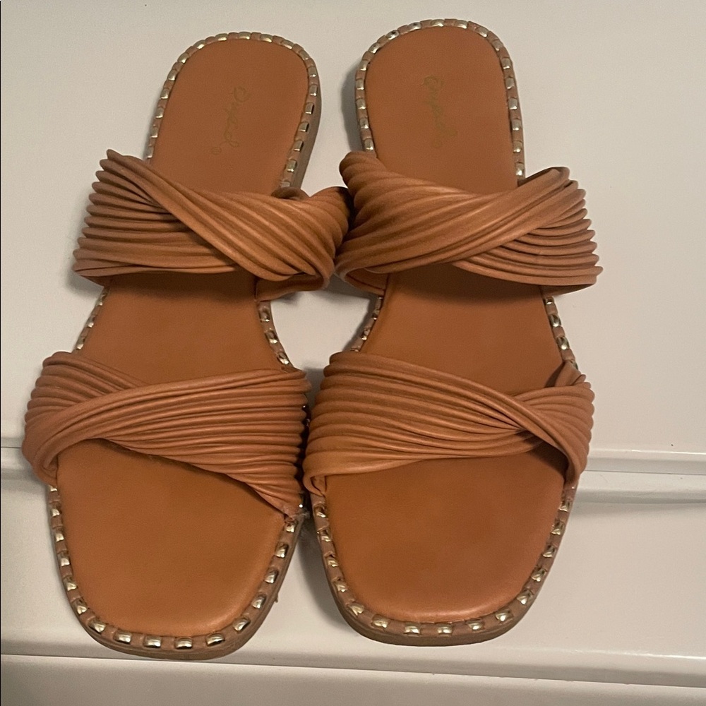 Lady size 9 from buckle sandals super cute with studs wore a couple times
